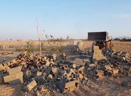 تخریب دیوار دو هکتارزمین کشاورزی تصرف شده در سیرجان