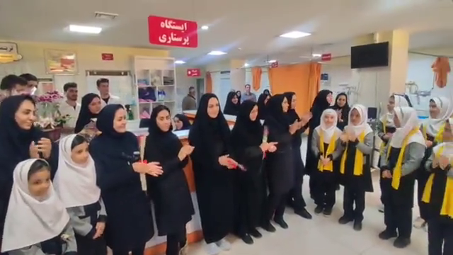 تجلیل دانش آموزان اسدآبادی از پرستاران اسدآباد