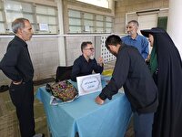 برپایی میزخدمت بنیاد شهید در محل برگزاری نماز جمعه تهران